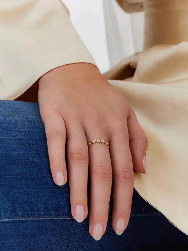 DANCING "ÉLITE" DIAMONDS ACCENTS AND TINY HAND-ENGRAVED GOLD BOULES RING