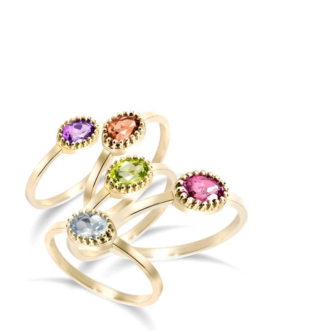 RING 'MA PETTIT' MET PERIDOT